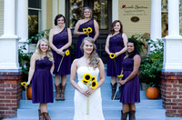 Bridesmaids posed around bride in Monroe, NC