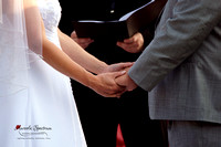 Bride and groom holding hands during Raleigh ceremony