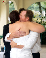 Bride hugs father at the wedding ceremony in Lake Lure, NC
