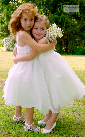 Flower girls hug in Cary, NC