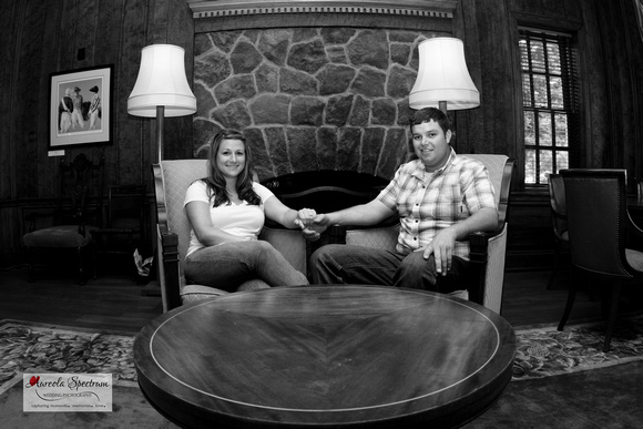 engagement photo of couple at historical hotel.