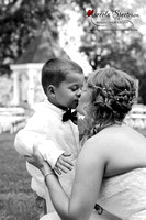 Candid moment between ring bearer and bride - monroe, nc