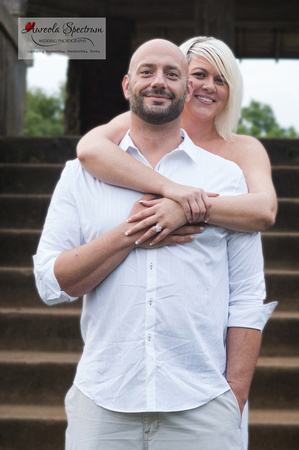 woman hugs her fiance in this engagement photo