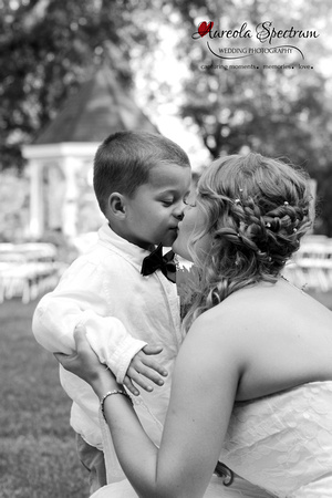 Candid of bride and ring bearer at Monroe, NC wedding.