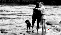 engaged couple with dog in a Columbia, SC river