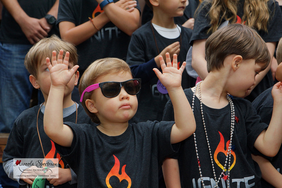 Heart kid wears sunglasses at camp luck 2016.