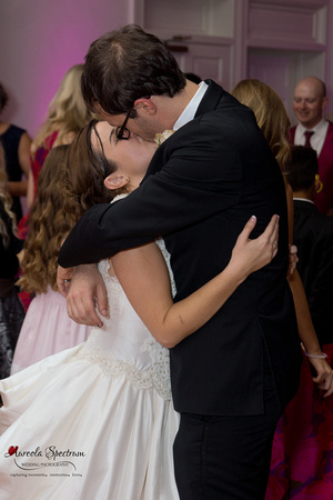 Bride and groom kiss during their last dance at their Greensboro, NC wedding reception.