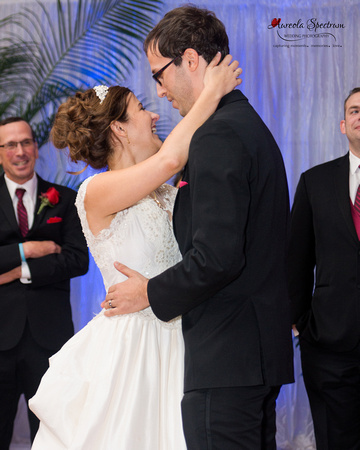 Couple candid moment of bride and groom's first dance.