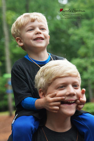Heart kid gets a piggyback ride at camp luck family camp 2016.