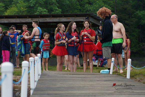 Heart kids before they jump into the cold lake at camp luck.