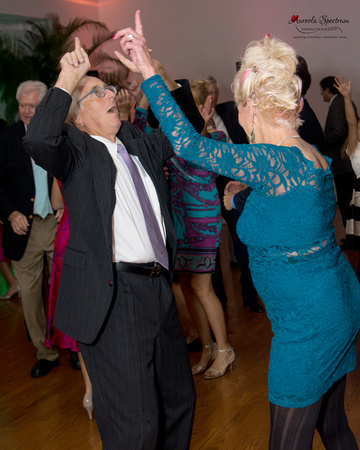 Guests groove at a Starmount Forest Country Club wedding reception.