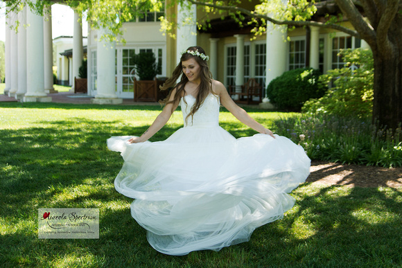 Bride twirls in her wedding dress in Belmont, NC.  