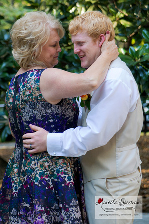 Sweet, candid moment during mother/son dance in Monroe, NC.